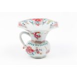 A spittoonExport porcelain Polychrome "Famille Rose" enamelled decoration of floral motifs and