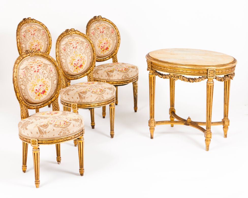 A salon setSettee, two fauteuils, four chairs and side table Carved and gilt wood with tapestry