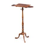 A lecternBrazilian rosewood With two extendable candle holders On a three feet turned column Europe,