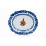 A scalloped armorial serving platter