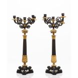 A pair of five branch Empire candelabra