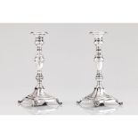 A pair of neoclassical style candelabra