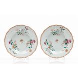 A pair of scalloped plates