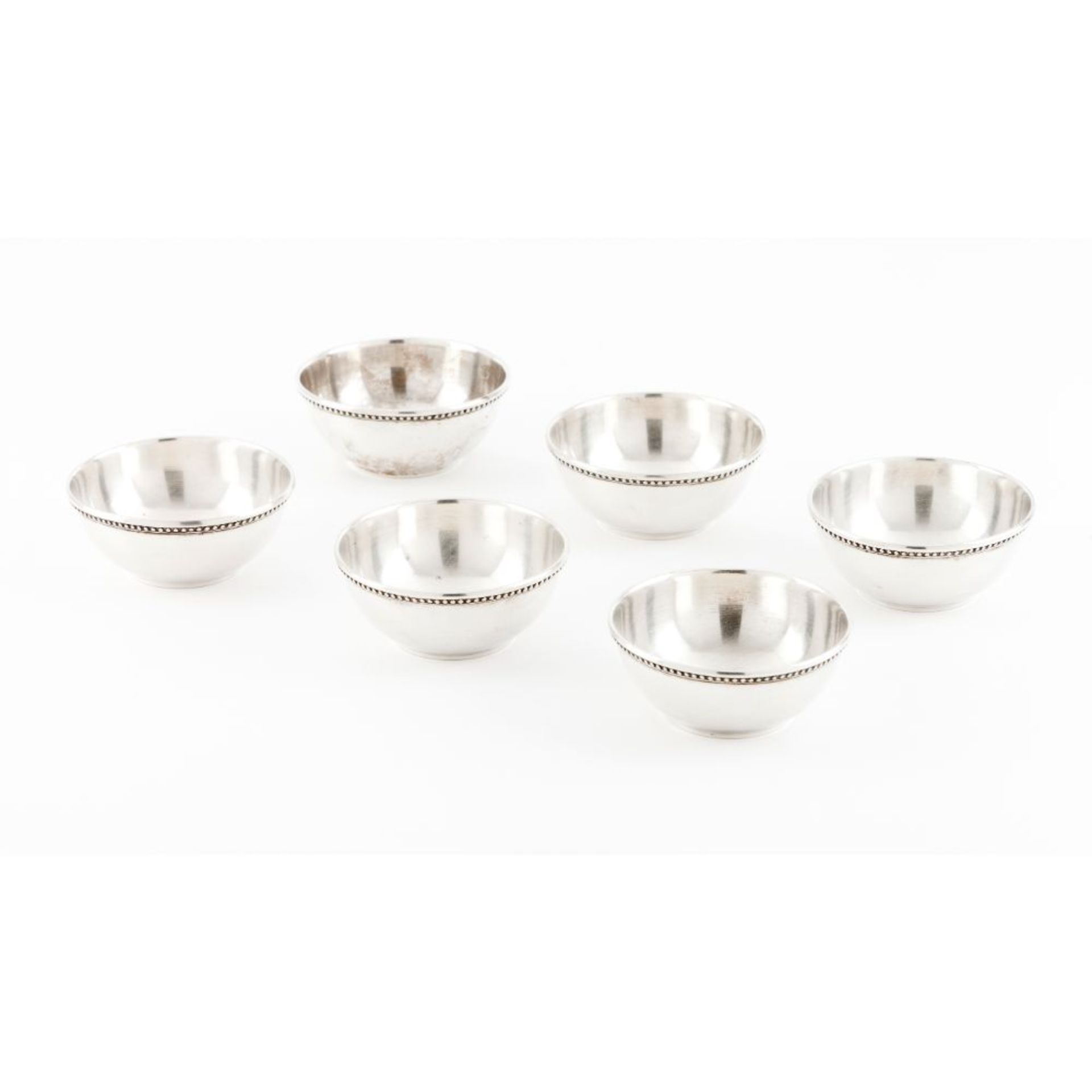 A set of six finger bowls