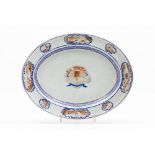 An oval armorial serving platter