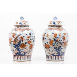 A pair of 'Imari' vases with covers