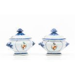 A pair of small armorial tureens