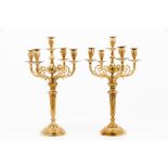 A pair of Louis XVI style five branch candelabra