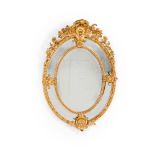 An oval wall mirror