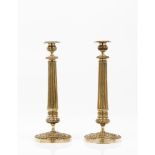 A pair of Louis XVI style candlestands