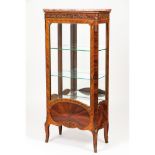 A Louis XVI style display cabinet