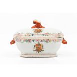 A small tureen with armorial cover