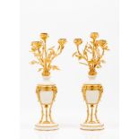 A pair of Louis XV style four branch candelabra