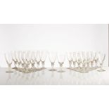 A SET OF 24 DRINKING GLASSES