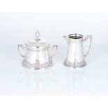 A neoclassical style sugar bowl and milk jug