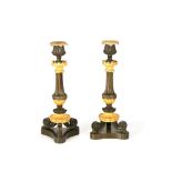 A pair of Louis XVIII candlesticks