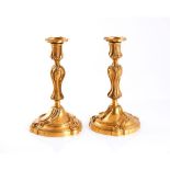 A pair of Louis XV style candlesticks