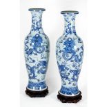 A massive pair of blue and white 'dragon' baluster vases