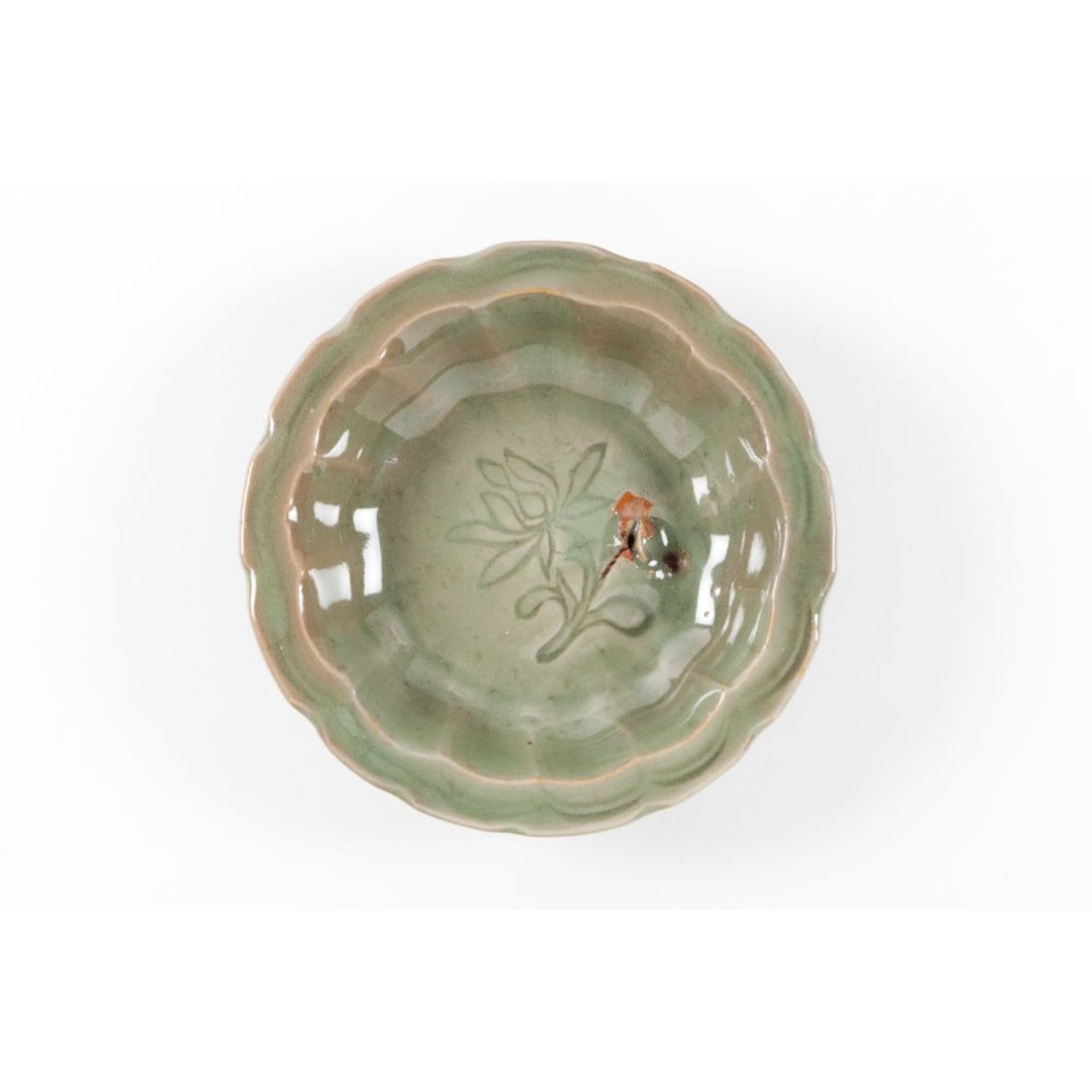 A small Longquan celadon 'lotus' dish