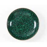 A pair of green-glazed black-ground saucer dishes