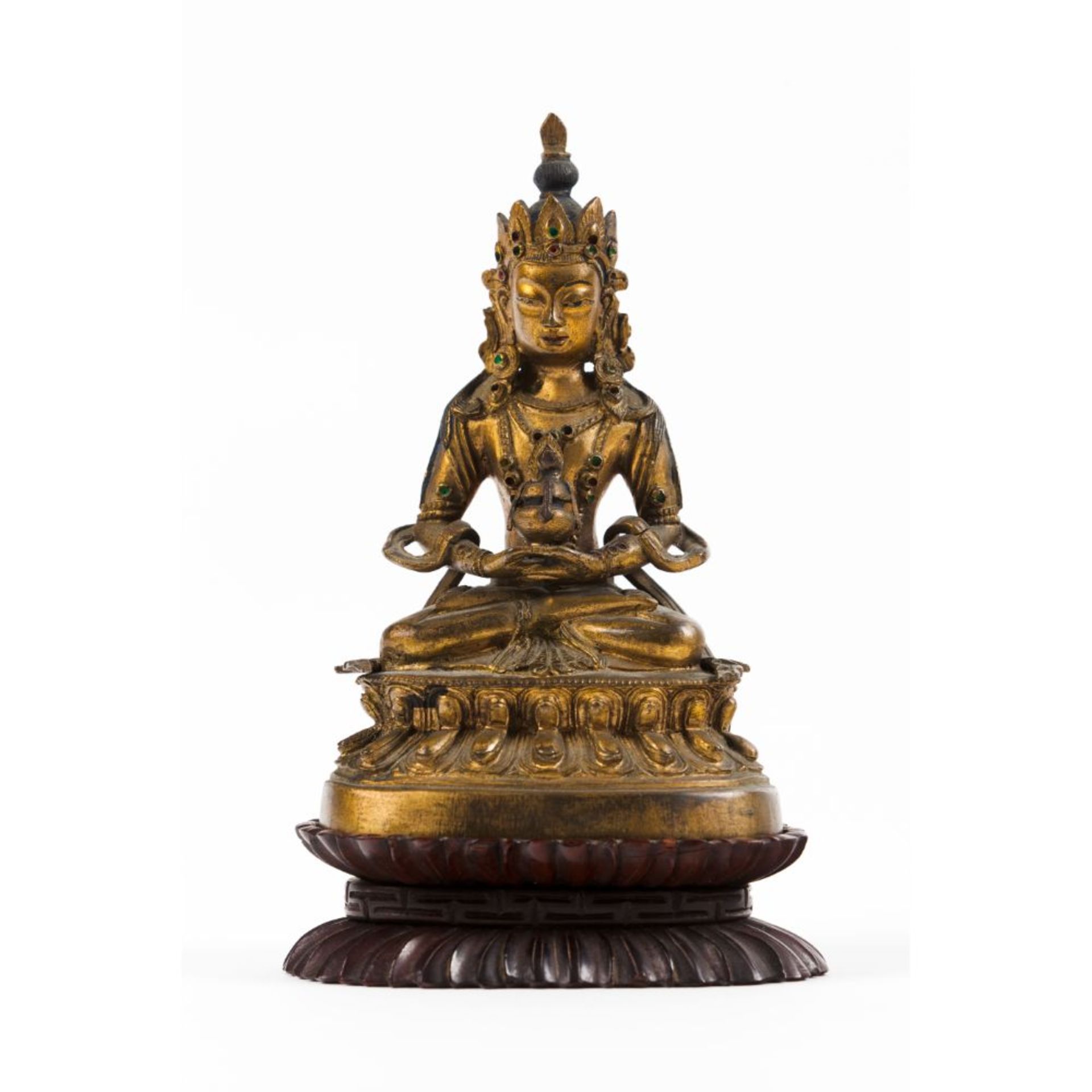A Tibetan gilt-bronze figure of Buddha Amitayus