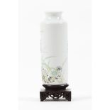 A Famille Rose 'locust and flowers' cylindrical vase
