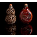 Two relief-decorated ceramic snuff bottles