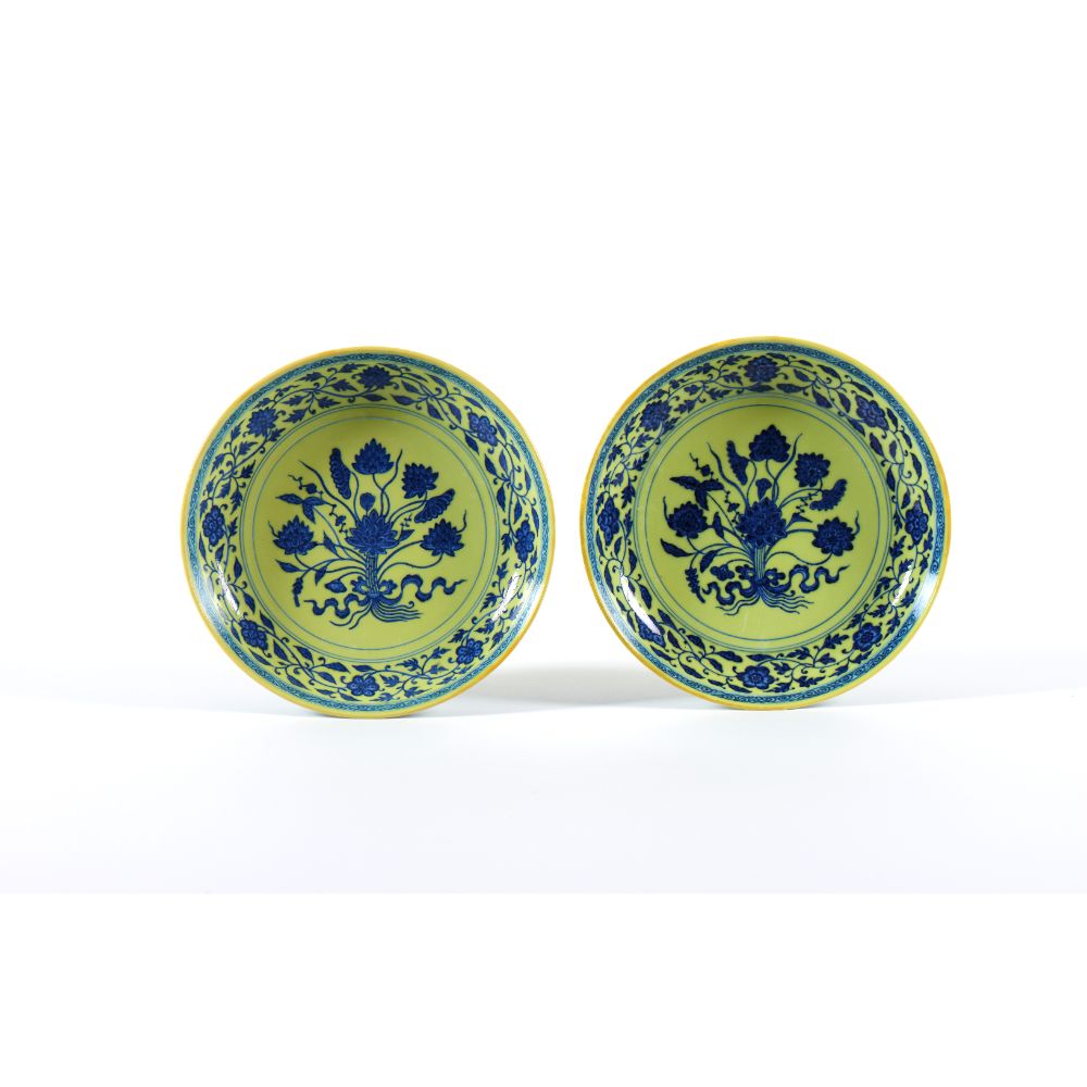 A pair of yellow and blue Ming-style 'Lotus Bouquet' dishes 