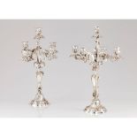 A pair of Louis XV style five branch candelabra