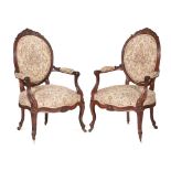 A pair of Louis XV/XVI style fauteuils