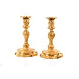 A pair of Louis XV style candlestands