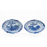 A pair of oval and scalloped serving platters