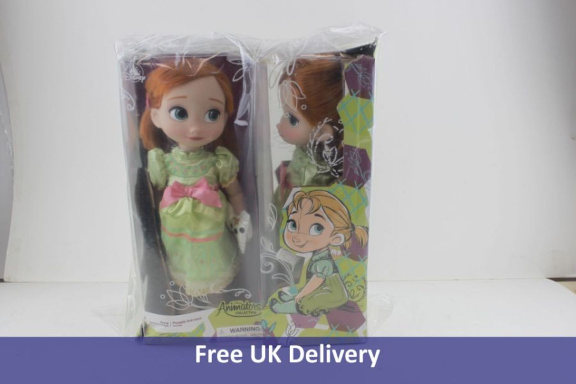 Two Disney Store Frozen 'Anna' Animator Dolls. Box damaged