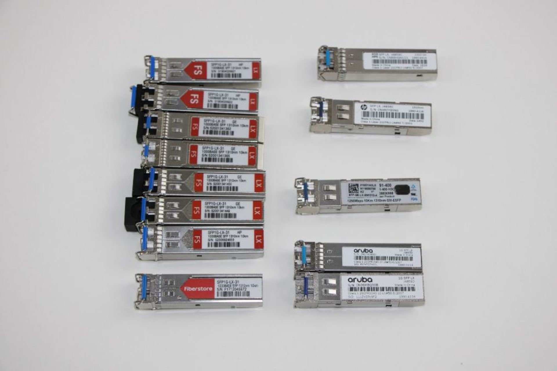 Thirteen Mixed FS SFP Modules to include 2x Aruba 1G SFPLX J48590, 2x HP SFPLX J4859C 1310NM Class 1