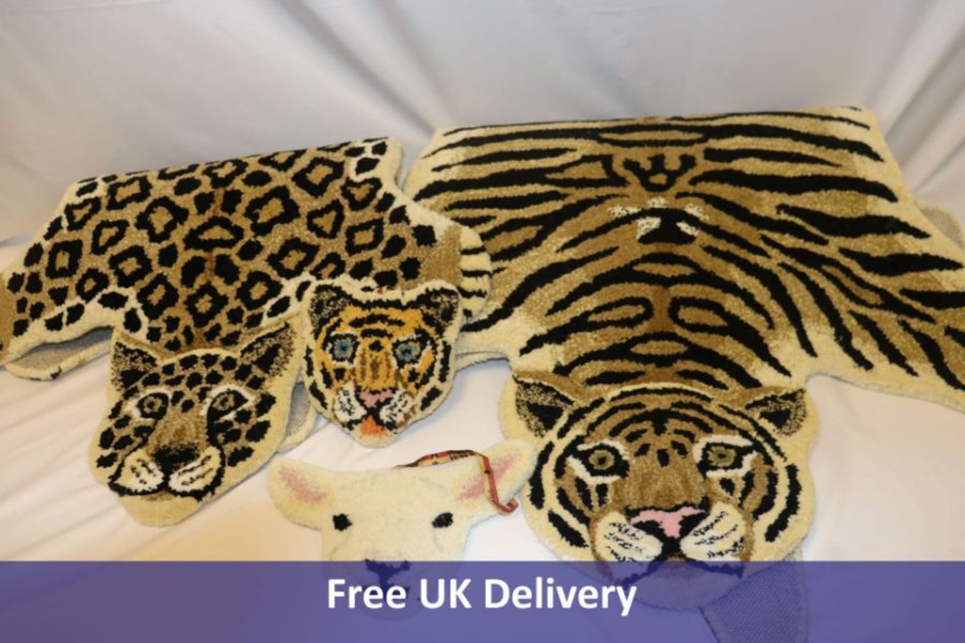 Four Doing Goods items to include 1x Large Tiger Rug, 1x Small leopard, 1x Sheep Head, Small, 1x Tig