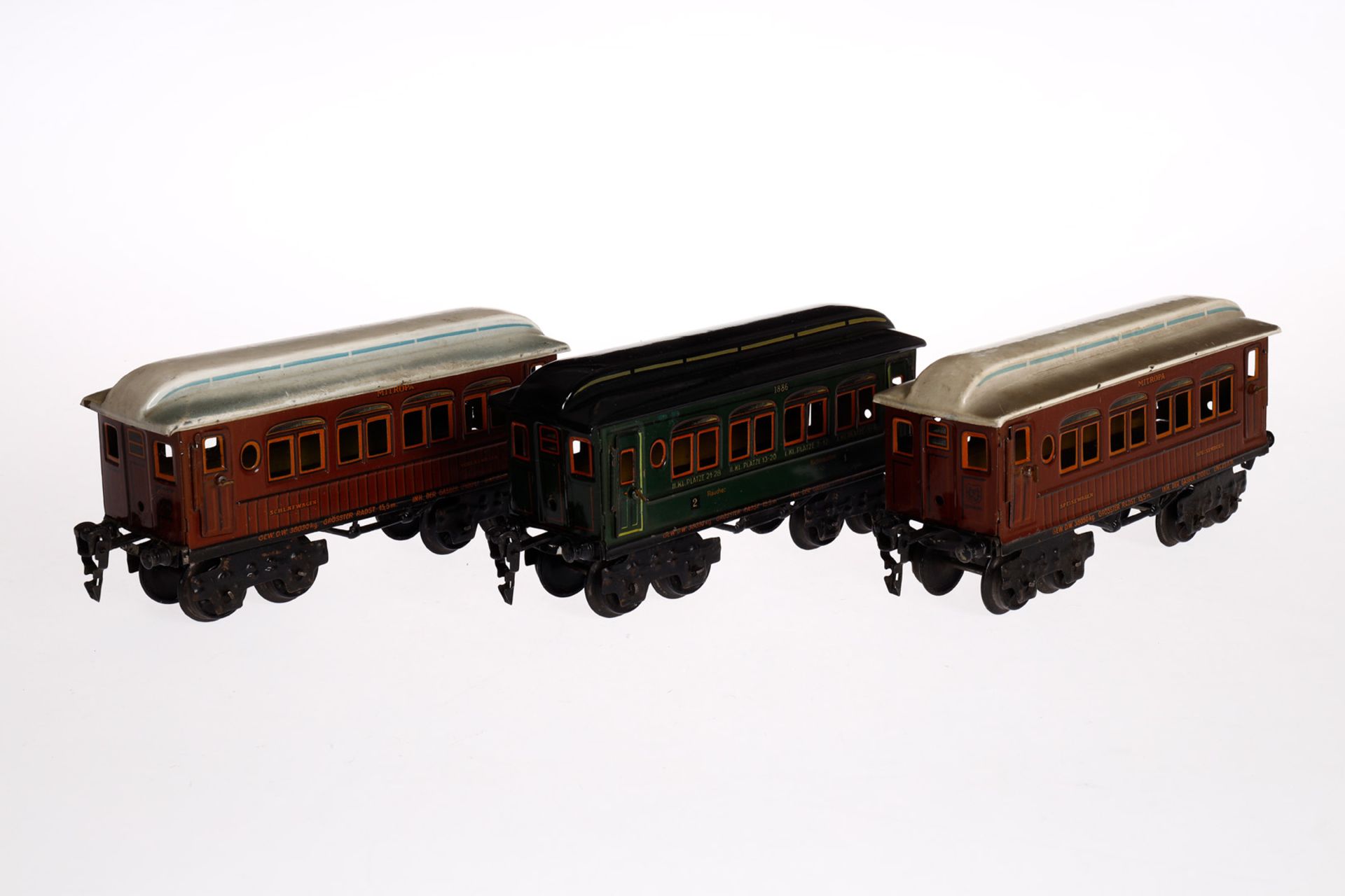 Märklin Zugpackung, Spur 0, Uhrwerk intakt, mit 2-B Dampflok E 1040, Tender, 3 Wagen 1886 und - Bild 6 aus 7