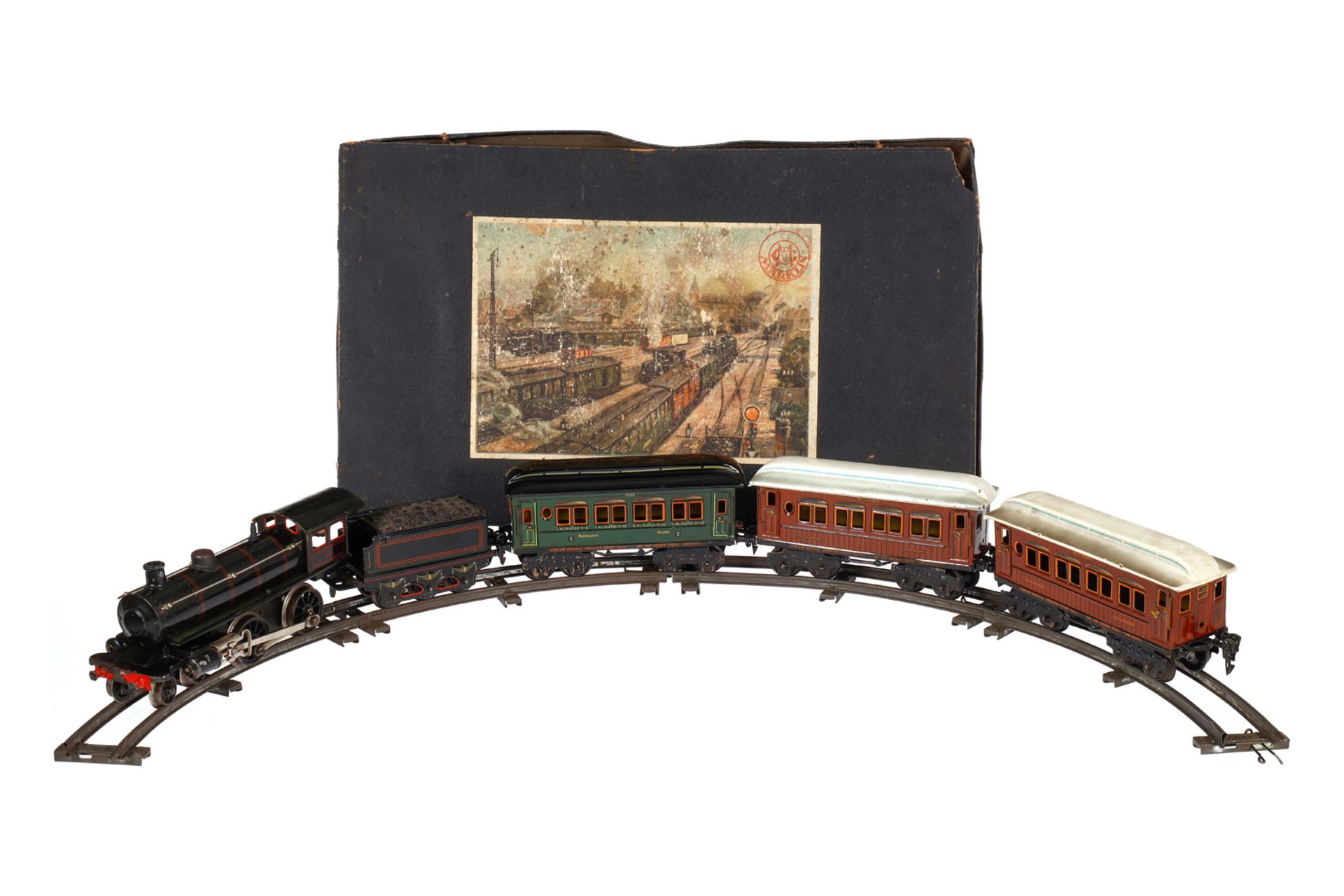 Märklin Zugpackung, Spur 0, Uhrwerk intakt, mit 2-B Dampflok E 1040, Tender, 3 Wagen 1886 und