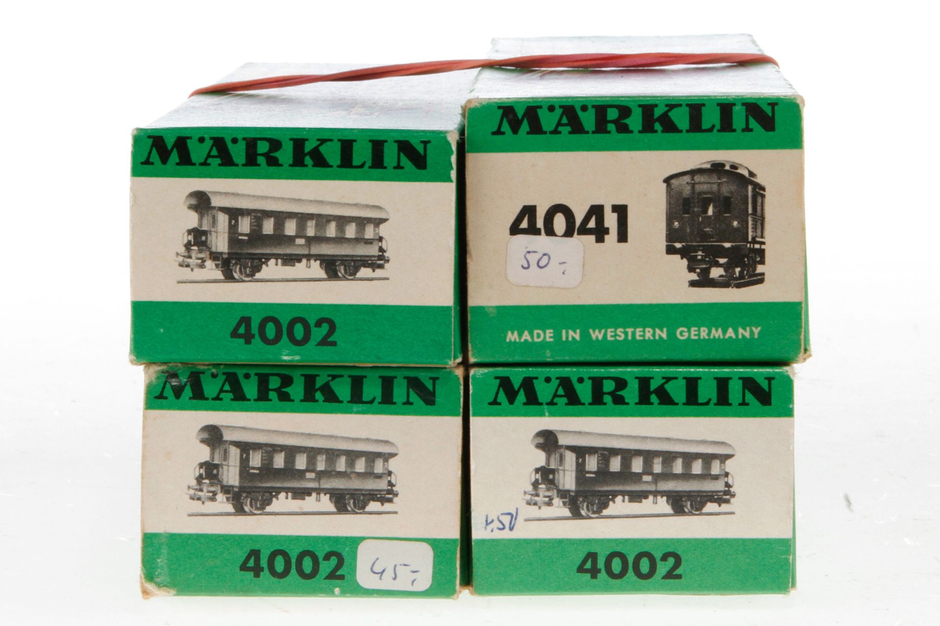 4 Märklin Wagen 3x 4002 und 4041, Spur H0, Alterungsspuren, je im OK, meist Z 2-3