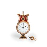 RARISSIMO OROLOGIO DA TAVOLO IN ORO, SMALTI E PERLINE, CON SUONERIA ORE E QUARTI, SVIZZERA, 1800