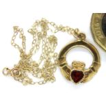 9ct gold and ruby set Claddagh pendant and chain, combined 1.6g. P&P Group 1 (£14+VAT for the
