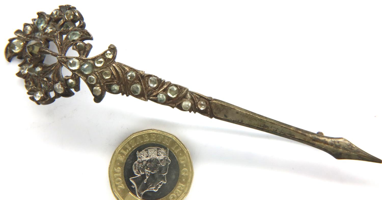 A white metal Kondakova brooch set with a multitude of rose cut stones, L: 11 cm. P&P Group 1 (£14+