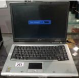 Acer Travelmate 2420 laptop operating Windows XP, password protected, with charger. P&P Group 3 (£