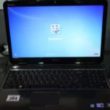 Dell Inspiron N5010 laptop with i3 processor and Windows 7 operating system, reg model P10F001. P&