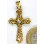14ct gold diamond set filigree design cross pendant, L: 42 mm, 3.4g. P&P Group 1 (£14+VAT for the