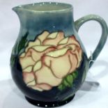 Large Moorcroft Collectors Club Roses jug, H: 16 cm. Crazing throughout but otherwise no cracks,