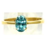 Modern 18ct gold zircon set solitaire dress ring, size M, 2.8g. P&P Group 1 (£14+VAT for the first