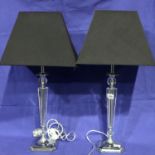 Pair of tall glass and chrome table lamps, H: 85 cm. Not available for in-house P&P, contact Paul