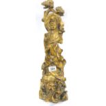 Large carved wooden Oriental deity, H: 55 cm. Not available for in-house P&P, contact Paul O'Hea