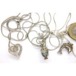 Three sterling silver necklaces with pendants to include a stone set heart example. Combined 18g.