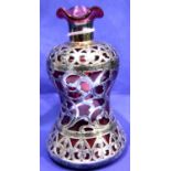 An early 20th century silver bound cranberry glass bottle (lacking stopper), H: 14 cm. P&P Group